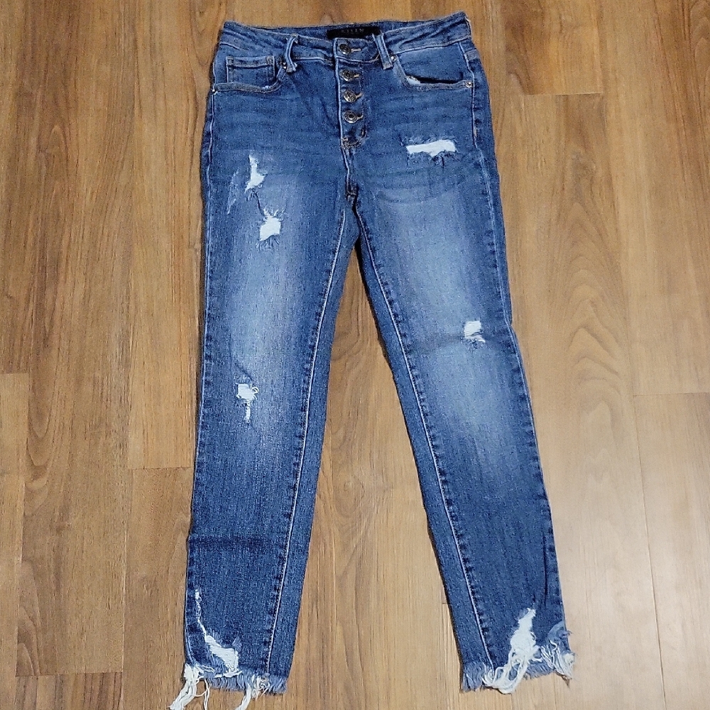 Risen Skinny Jeans with Distressed Raw Hem and Button Fly